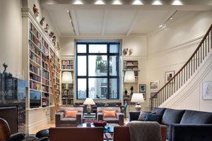 On the Upper West Side, a former artist’s loft is now a grand $4.8M duplex with library wall