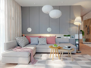 Sugar pink accents sweeten the soft grey interior of this modern family home, where layers of geometric pattern layer in interest and energy