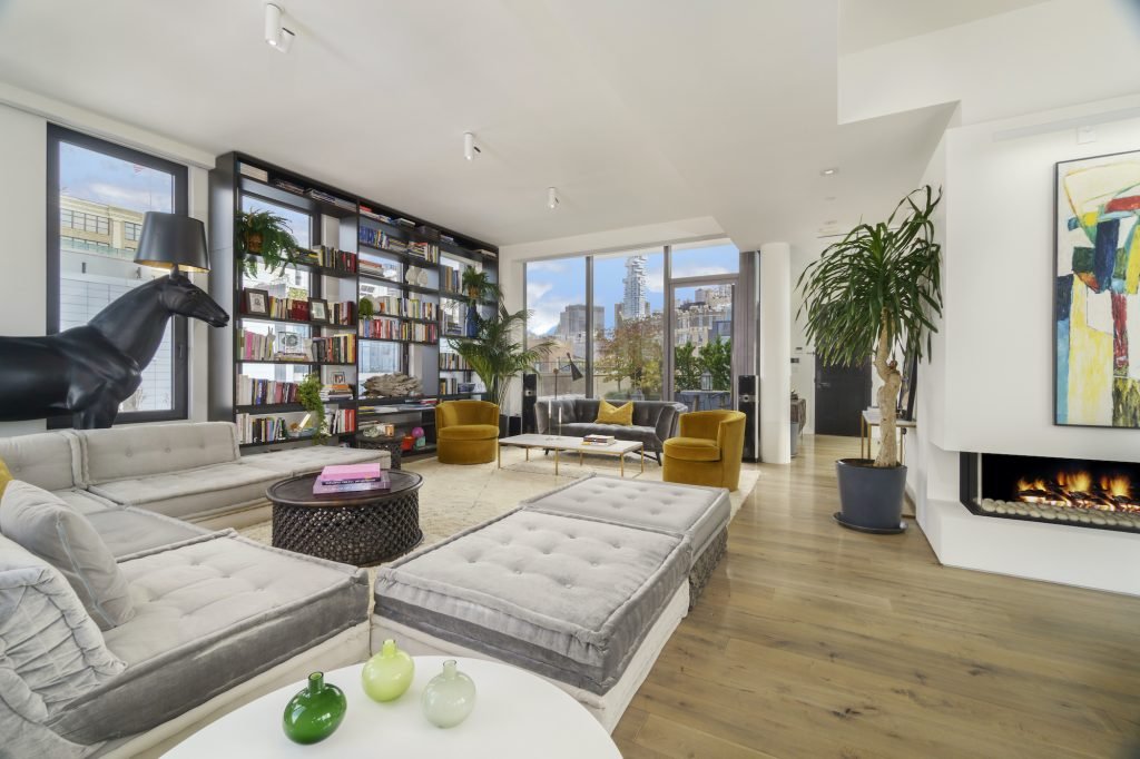 This $8.9M Soho penthouse is a private garden retreat with a hot tub and an outdoor kitchen